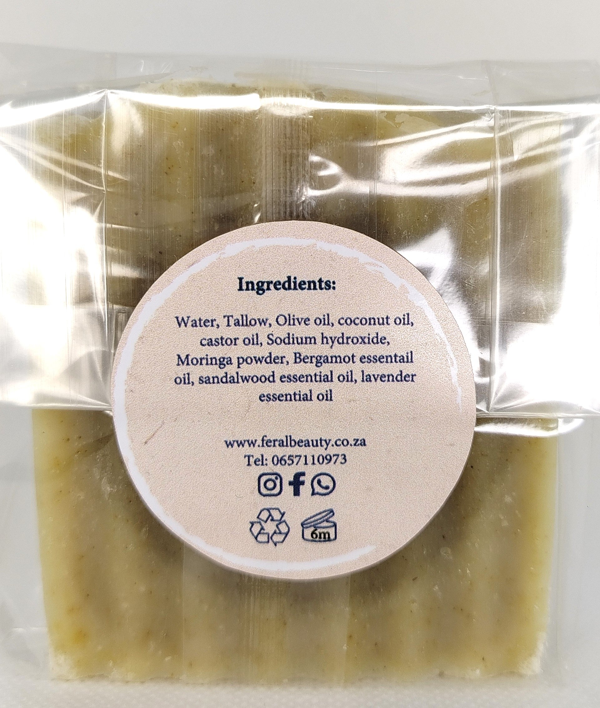 Feral Wash Tallow soap with a label showing ingredients and branding details on a white background