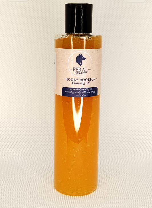Bottle of Feral Beauty Honey Rooibos Cleansing Gel on a white background tallow based skincare brand