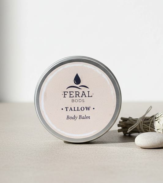 Feral Bods tallow body balm jar on a neutral background